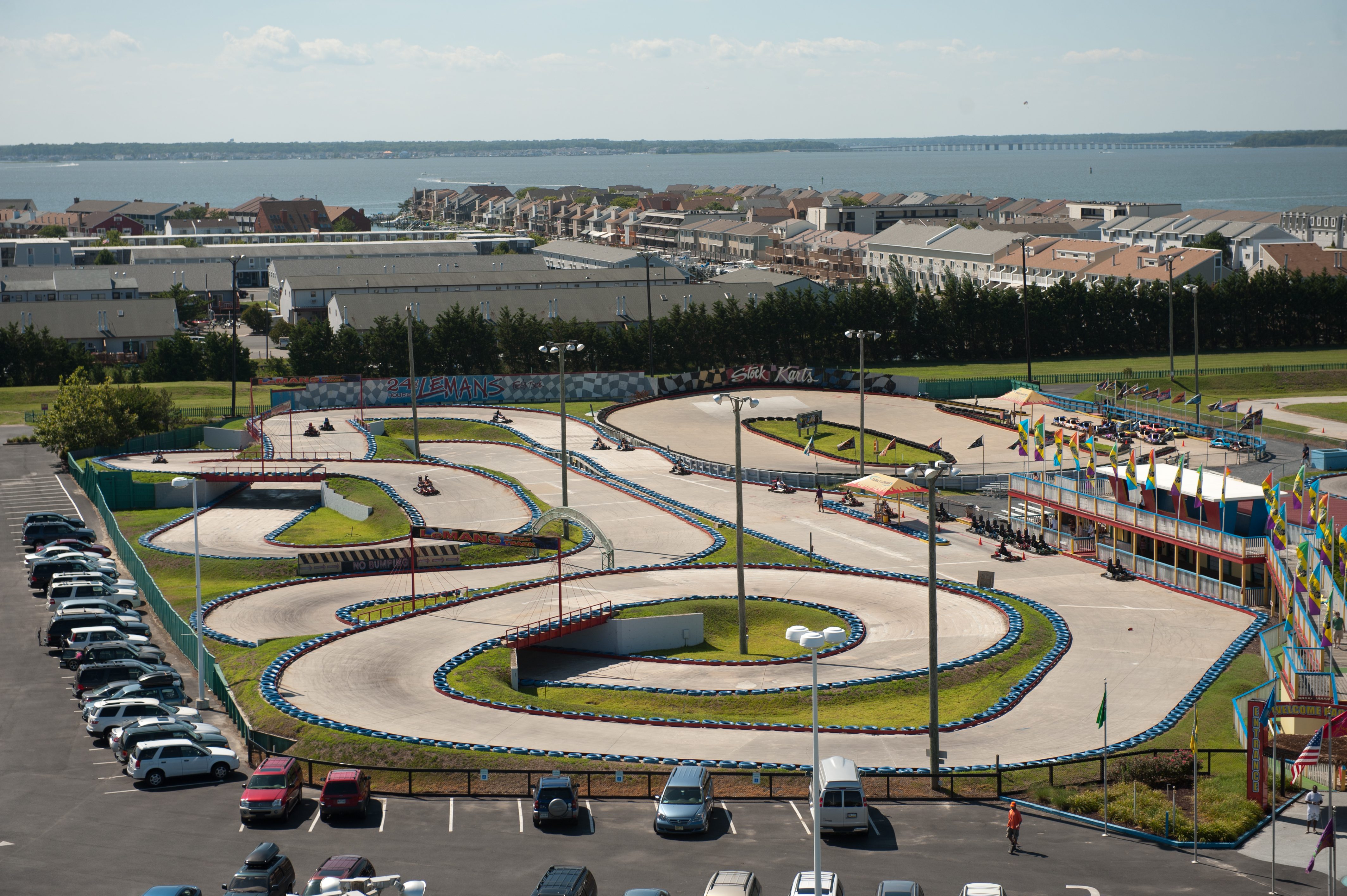 bird's eye view of race car tracks in front of the bay