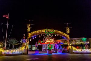 Jolly Roger Park at night with bright Christmas lights