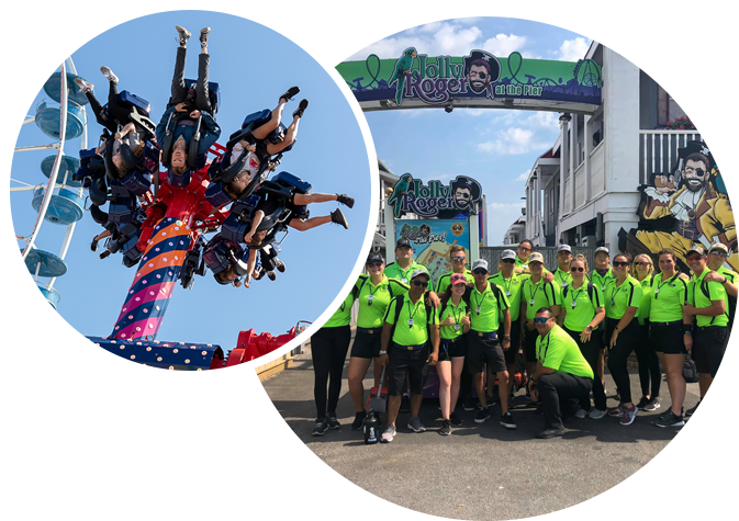 Jolly Roger riders and employees in front of the gate