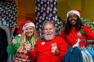 Jolly Roger Black Friday employees in santa hats