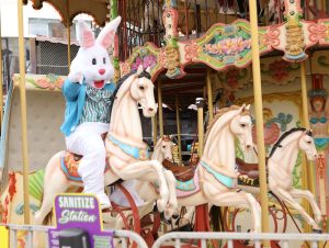 Easter Bunny riding the carousel